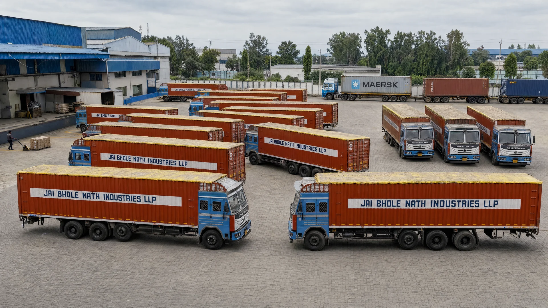 Generated illustration of the company fleet and container-carrying trailers in an Indian depot